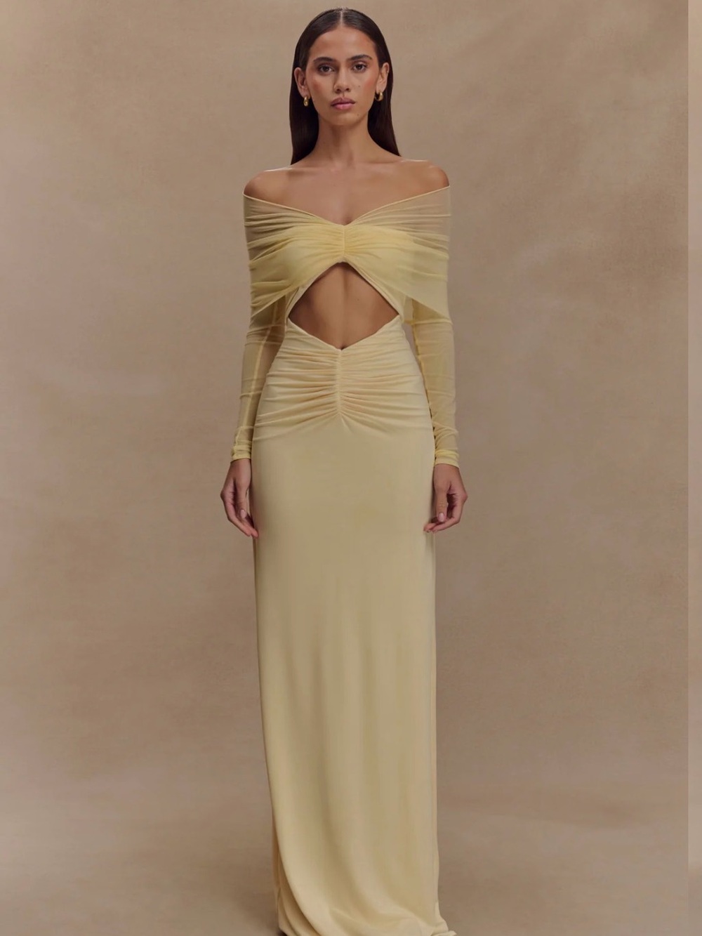 Meshki Long Sleeve Off-Shoulder Cutout Gown in Pale Yellow